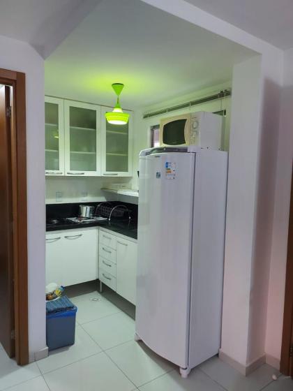 Confortável apartamento de 2 quartos para 5 pessoas totalmente mobiliado com excelente wifi e tv a cabo localizado a apenas uma quadra do calçadão da Praia de Ponta Negra prédio com piscina churrasqueira e portaria virtual e eletrônica 24 horas - image 29